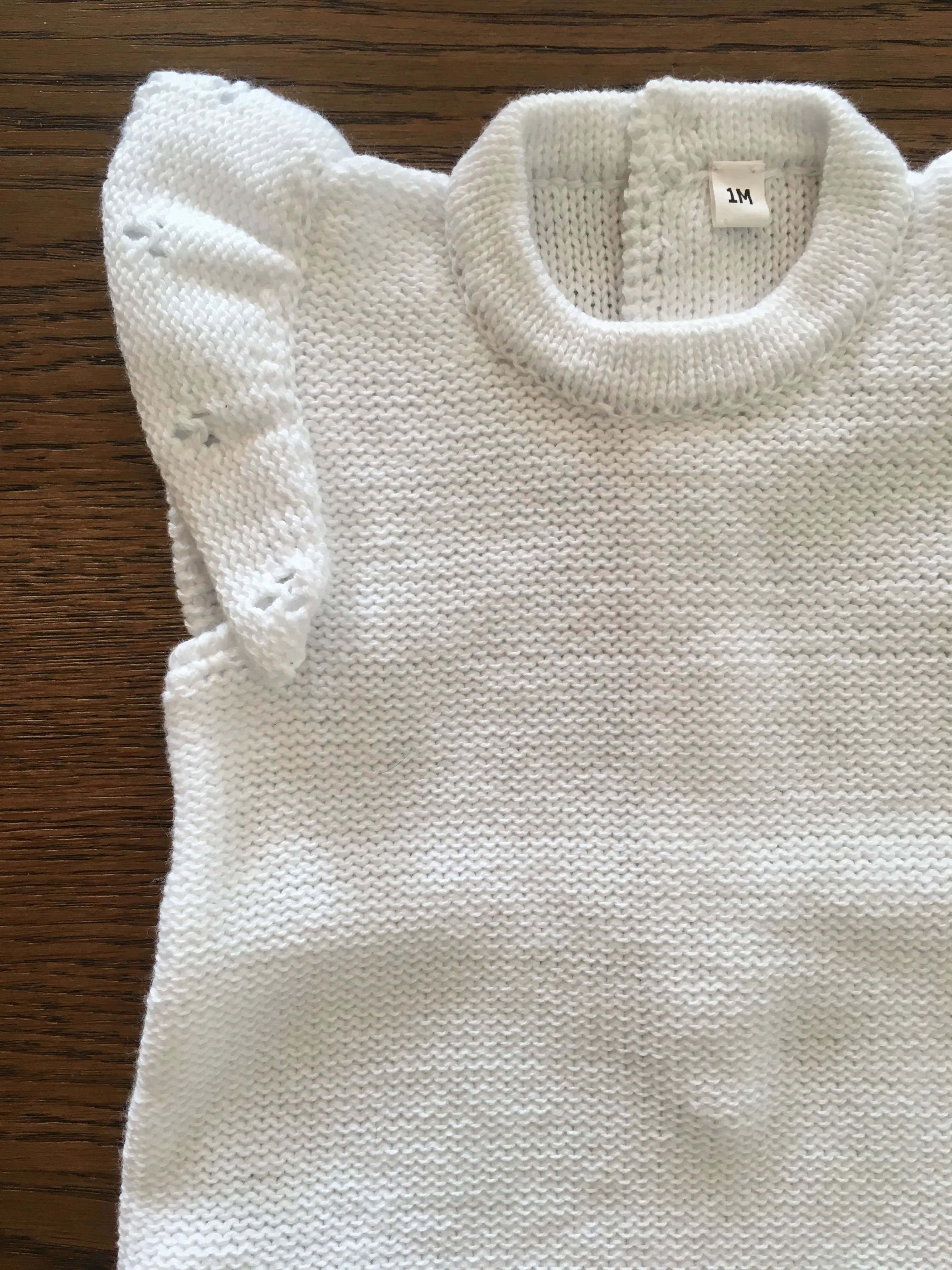 Frilled knitted romper