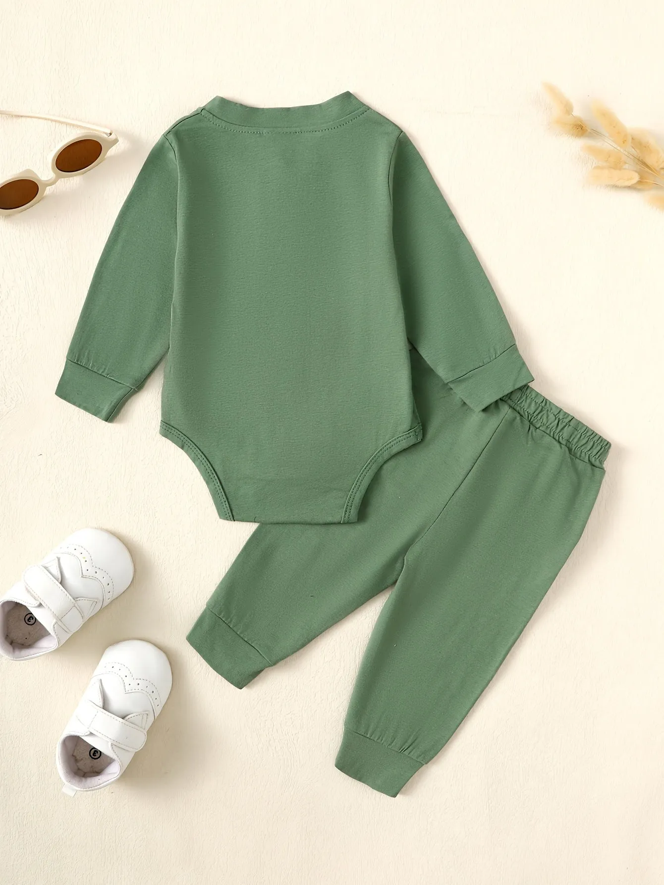 Striped snapup romper and trousers set for baby boys